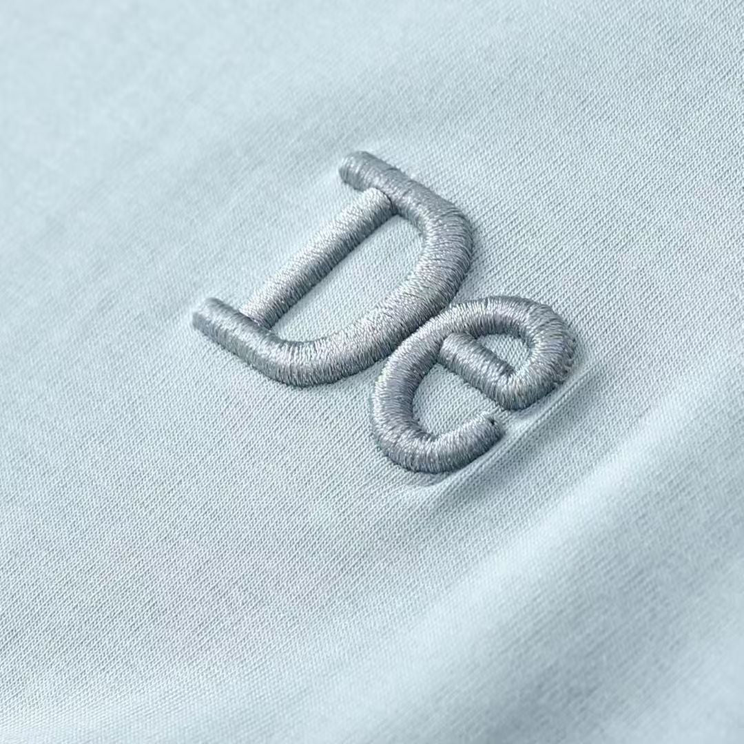 サイドツイスト変則裾Tシャツサマーシンプルな刺繍プラスショルダーホワイトTシャツウエストを収めて細く見せる
