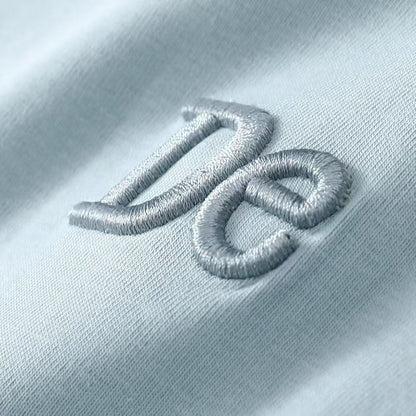 サイドツイスト変則裾Tシャツサマーシンプルな刺繍プラスショルダーホワイトTシャツウエストを収めて細く見せる