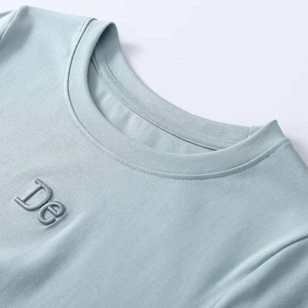 サイドツイスト変則裾Tシャツサマーシンプルな刺繍プラスショルダーホワイトTシャツウエストを収めて細く見せる